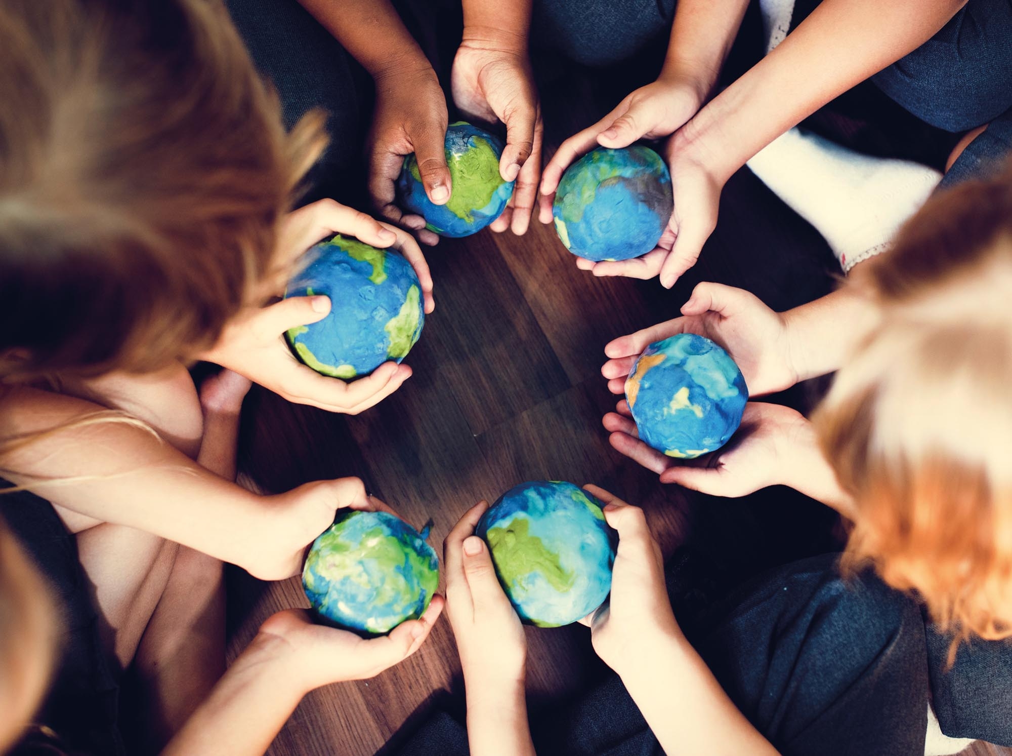 Kids,Holding,The,World,In,Their,Hands Kids,Holding,The,World,In,Their,Hands